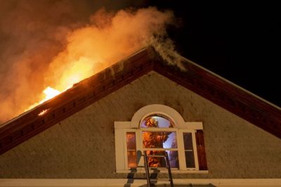 Dylan Kelley | The Herald of Randolph (Vermont)
Firefighters from four towns—Bethel, East Randolph, Royalton, and Barnard—battle an apartment fire in downtown Bethel in the pre-dawn hours of Sunday morning. (4/4/19)