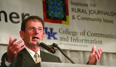 Chris Evans of The Crittenden Press in Marion, Kentucky, spoke after receiving the Al Smith Award for public service through community journalism by Kentuckians, which he shared with his wife, Allison Mick-Evans. They own the weekly newspaper in Crittenden County, pop. 9,000.  (Photo by Yung Soo Kim, University of Kentucky School of Journalism and Media)